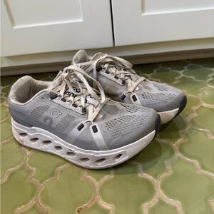 Gray and White Athletic Tennis Shoes by On Cloud